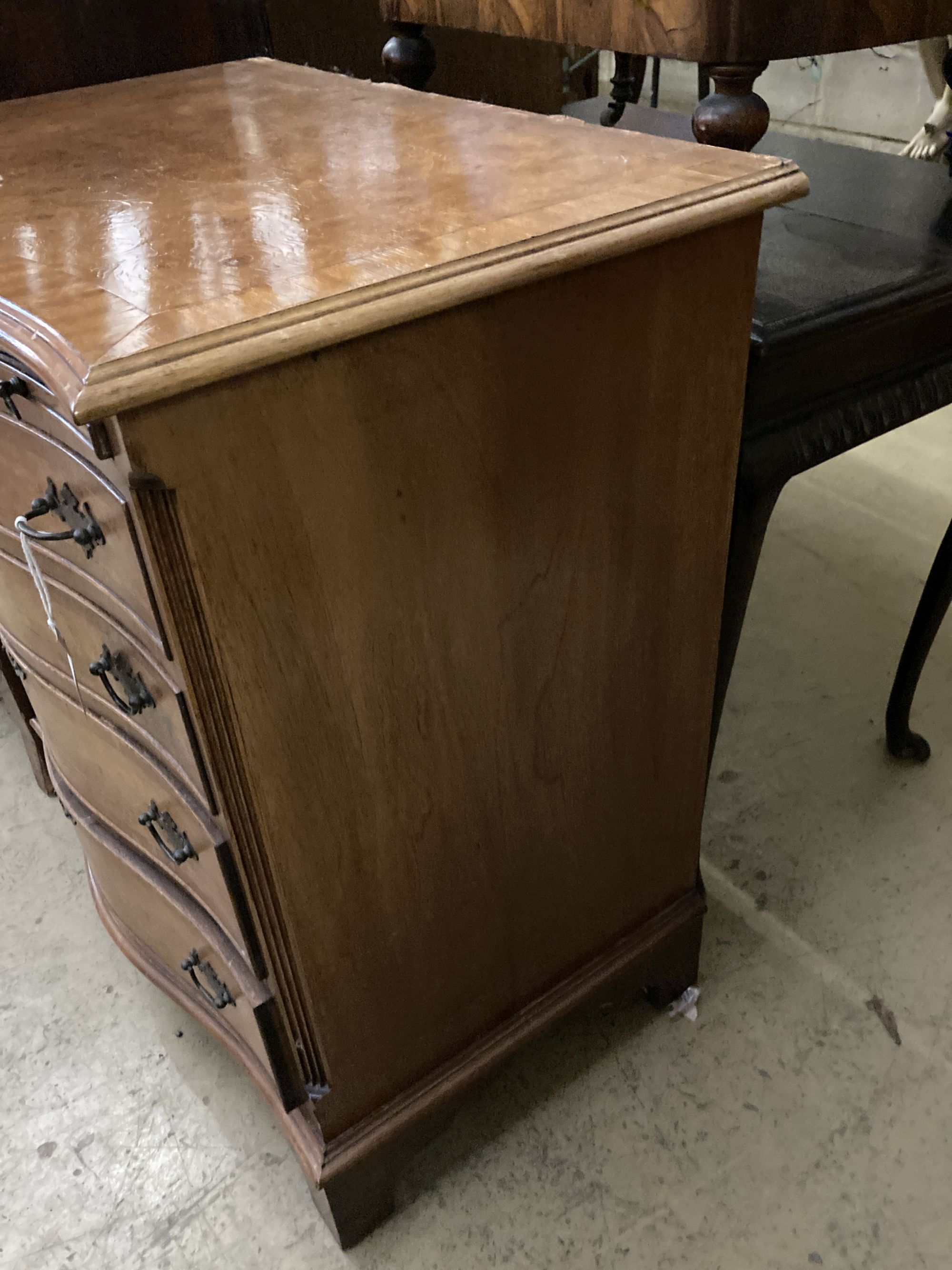 A George III style serpentine fronted, banded walnut chest, fitted four long drawers, width 70cm, depth 48cm, height 78cm